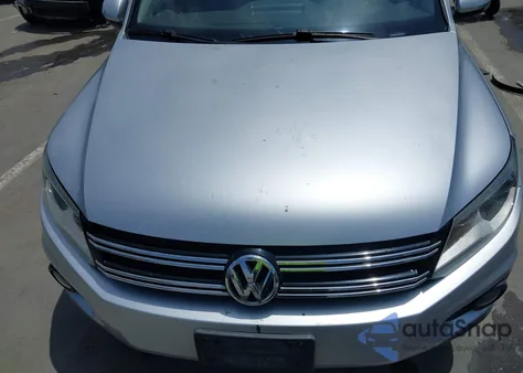 2014 Volkswagen Tiguan Sel z USA, uszkodzony, nr VIN WVGAV3AX2EW557480